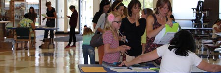 Families registering for school.